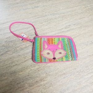 NWT Angie zip around wristlet with studs by Mudd